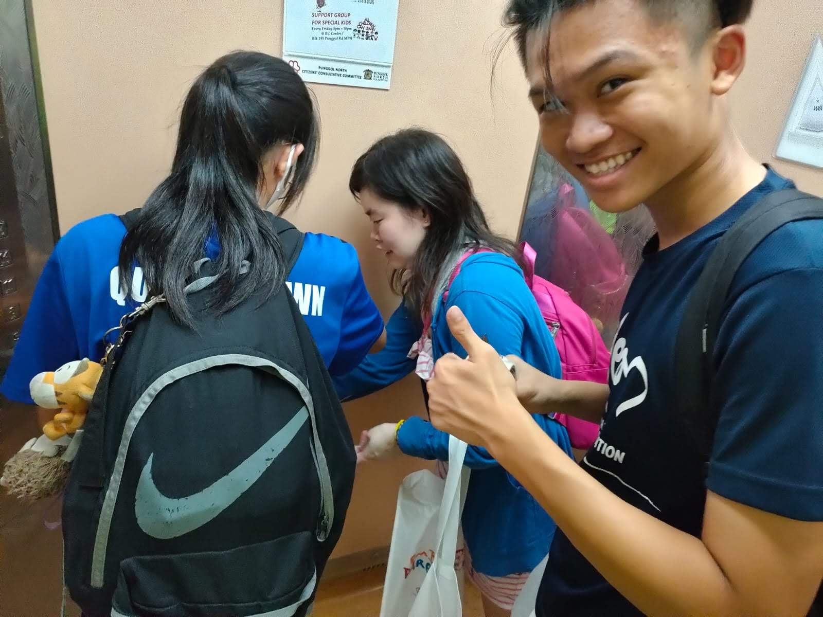 photo of me installing hand sanitizers