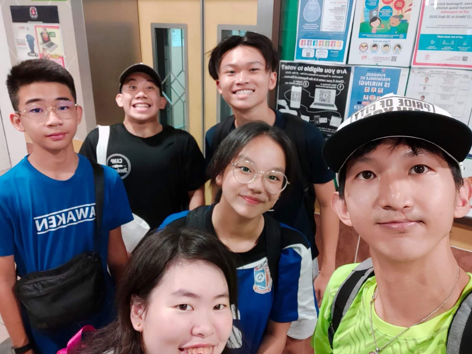 photo of us after we finished installing hand sanitizers